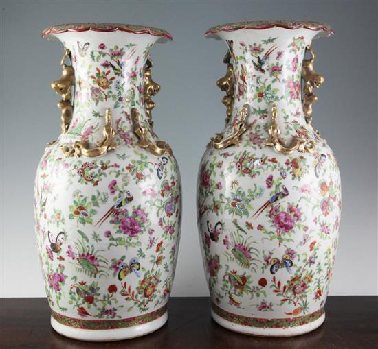A pair of 19th century Cantonese famille rose baluster vases, 17.5in.